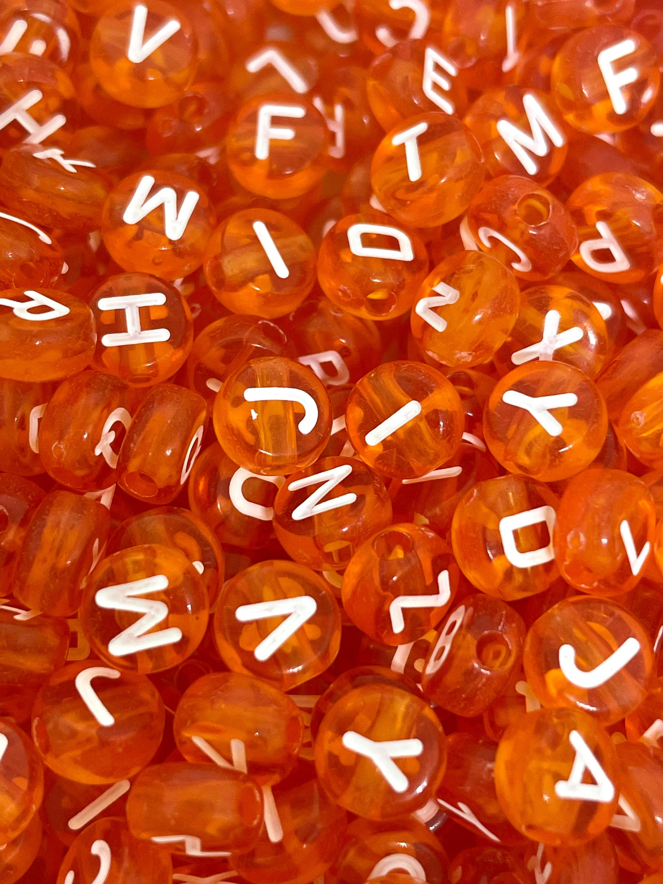 Translucent Orange Letter Beads: Spooky Alphabet for Halloween Crafts